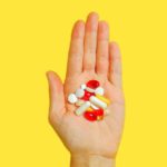 Vitamins - Person With Bunch Medication Pills on Hand