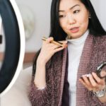 Fashion Tips - Vlogger Applying Makeup and Live Streaming with her Phone