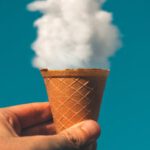 Creativity - Man Holding Ice Cream Cone Under Cloud